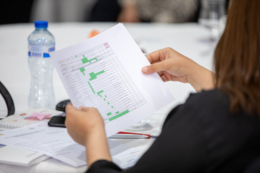 Timetable is held in hands